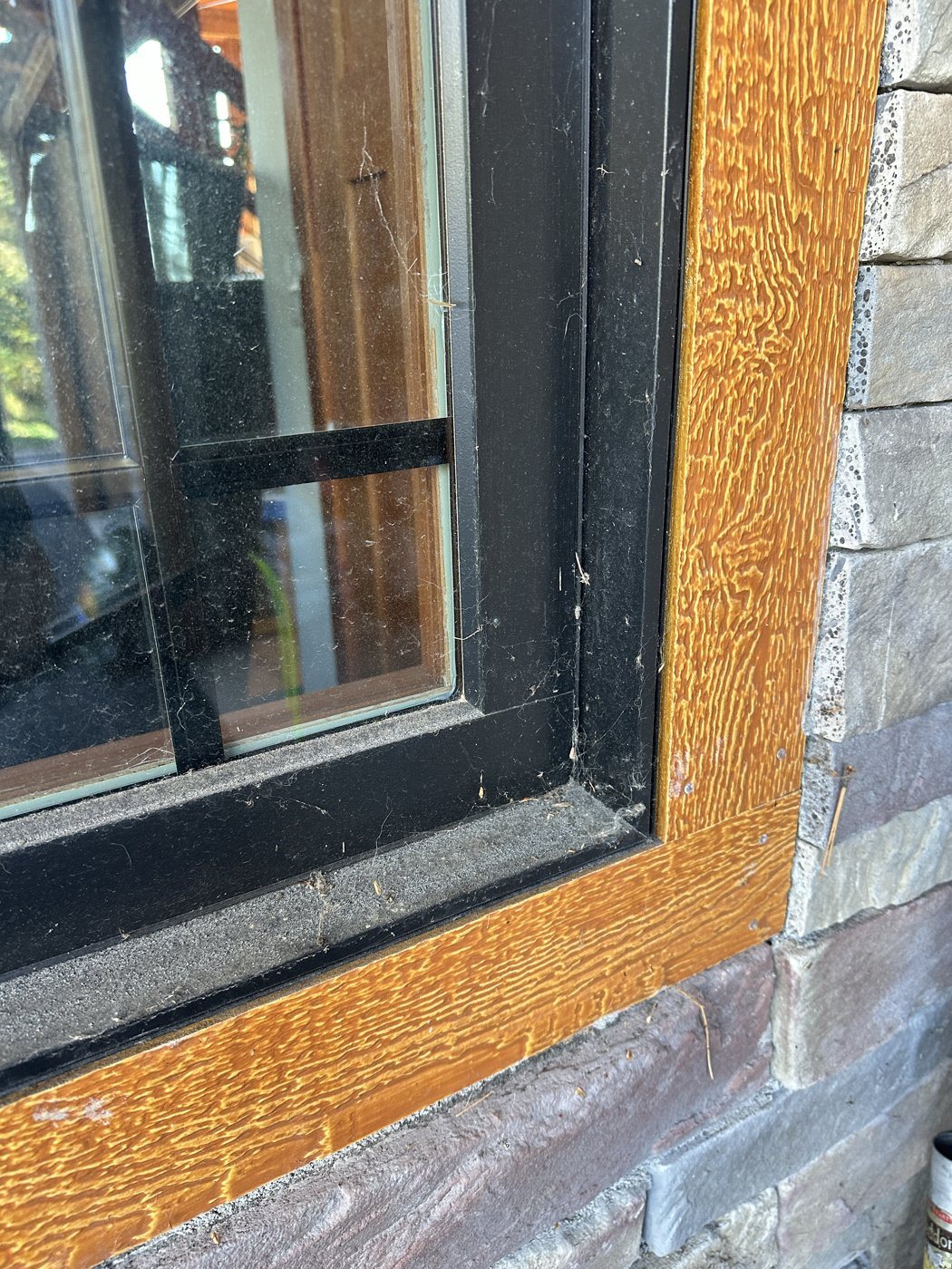 Before: Grime off the glass and off the frame on a North Shore home