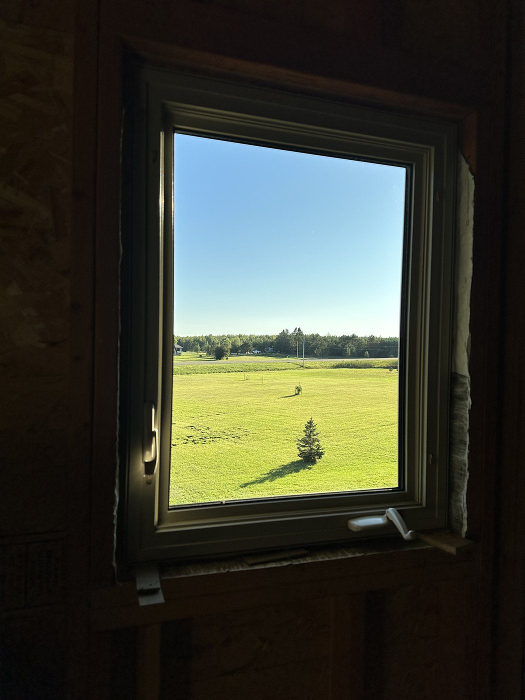 After: Water-spotted glass, and the view behind it by Clear Vue